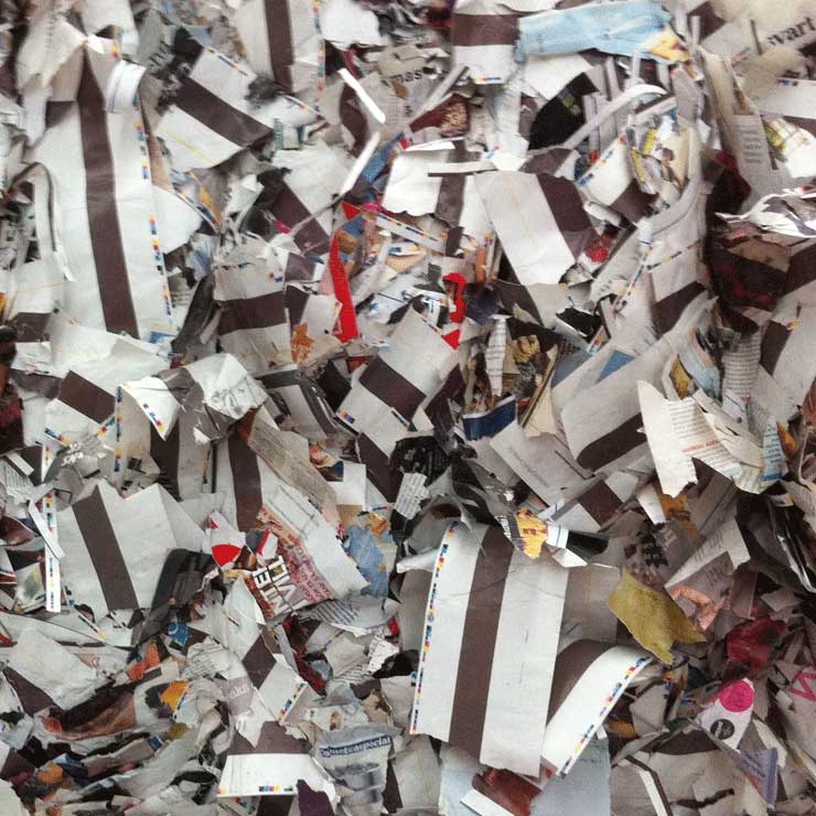 Balles de papiers et cartons récupérés