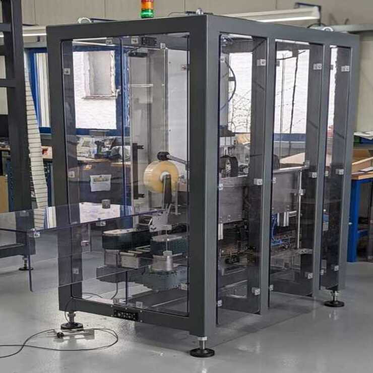 Kartonverschliesser Verpackungsmaschine Totale