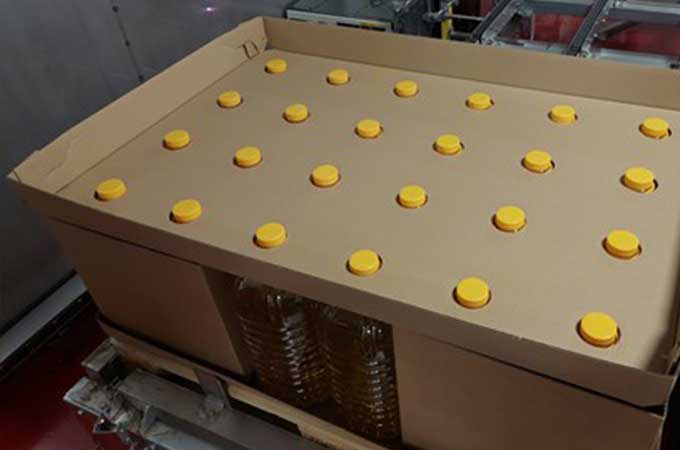 Sikker transport af 10L flasker med mindre materiale, lavere omkostninger og reduceret CO₂-aftryk