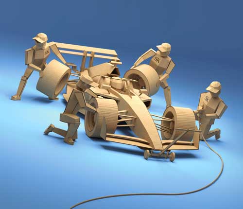 Une animation 3D en carton ondulé représentant une voiture de F1 dans son écurie.
