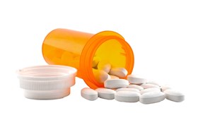 Représentation d'un pot de médicament renversé