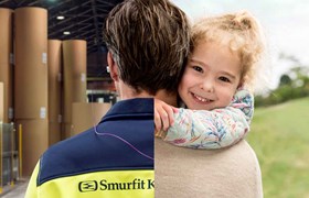 Montage photo d'un homme de dos, la moitié dans une usine et l'autre moitié dans un champ tenant dans les bras une petite fille