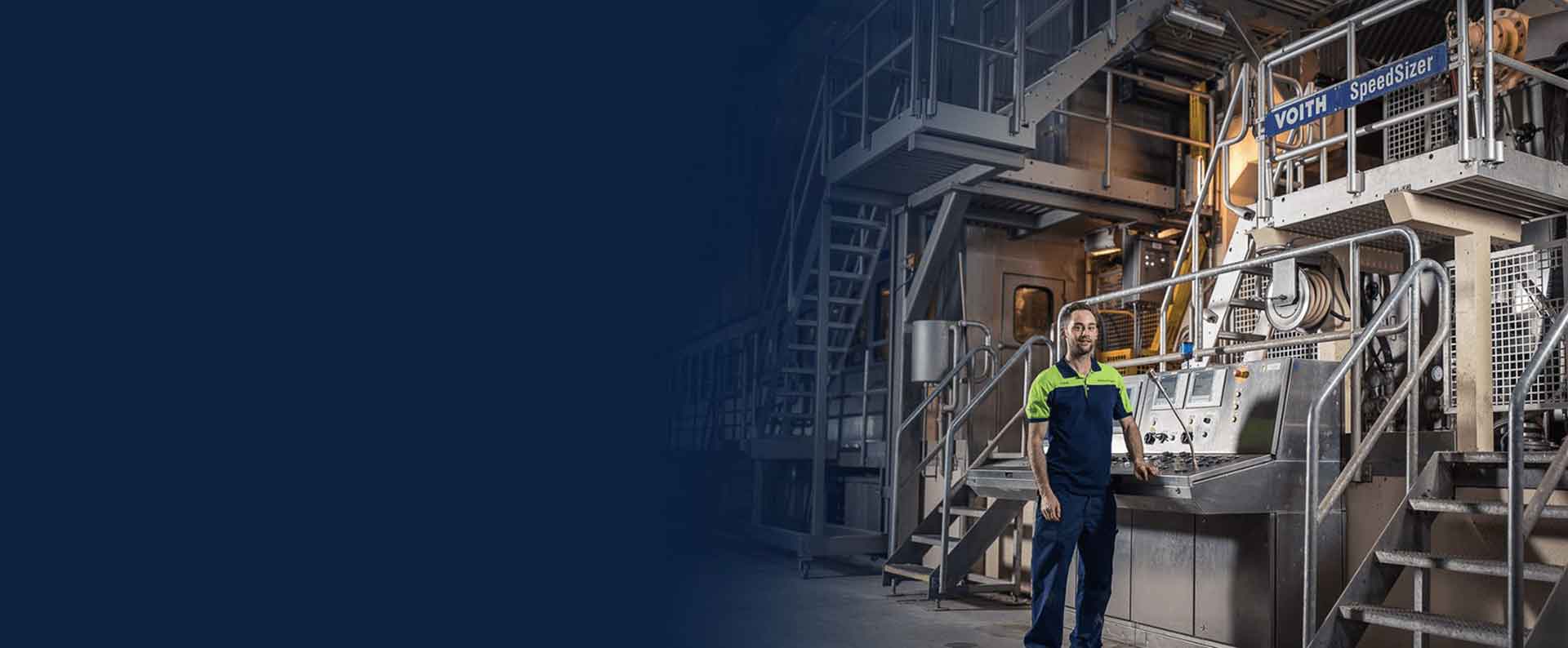 Employee-at-paper-machine