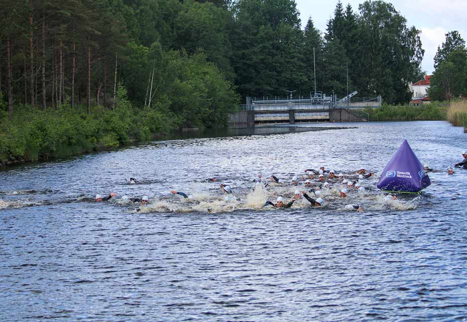 Swimmers in canal
